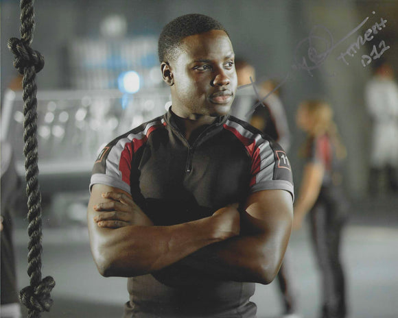 Dayo Okeniyi 10X8 signed in Silver Hunger Games