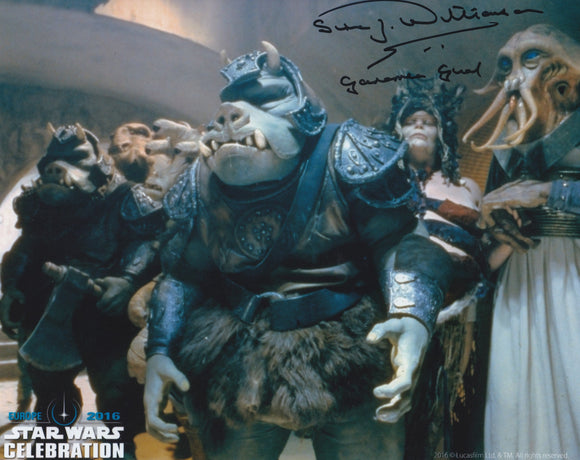 Simon Williamson 10x8 signed in Black Star Wars the Return of The jedi Celebration Image